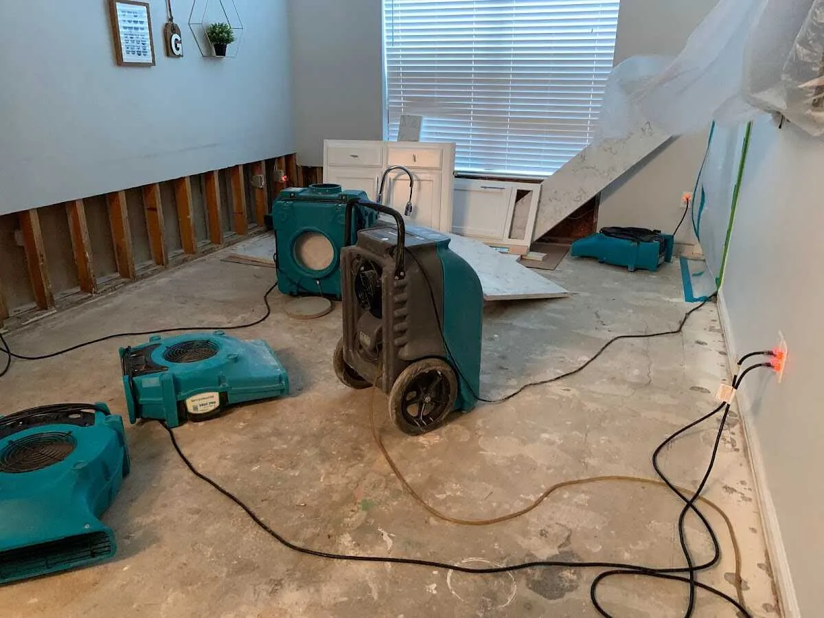 Dehumidifier in flood-cut room for Water Damage Restoration in Del City